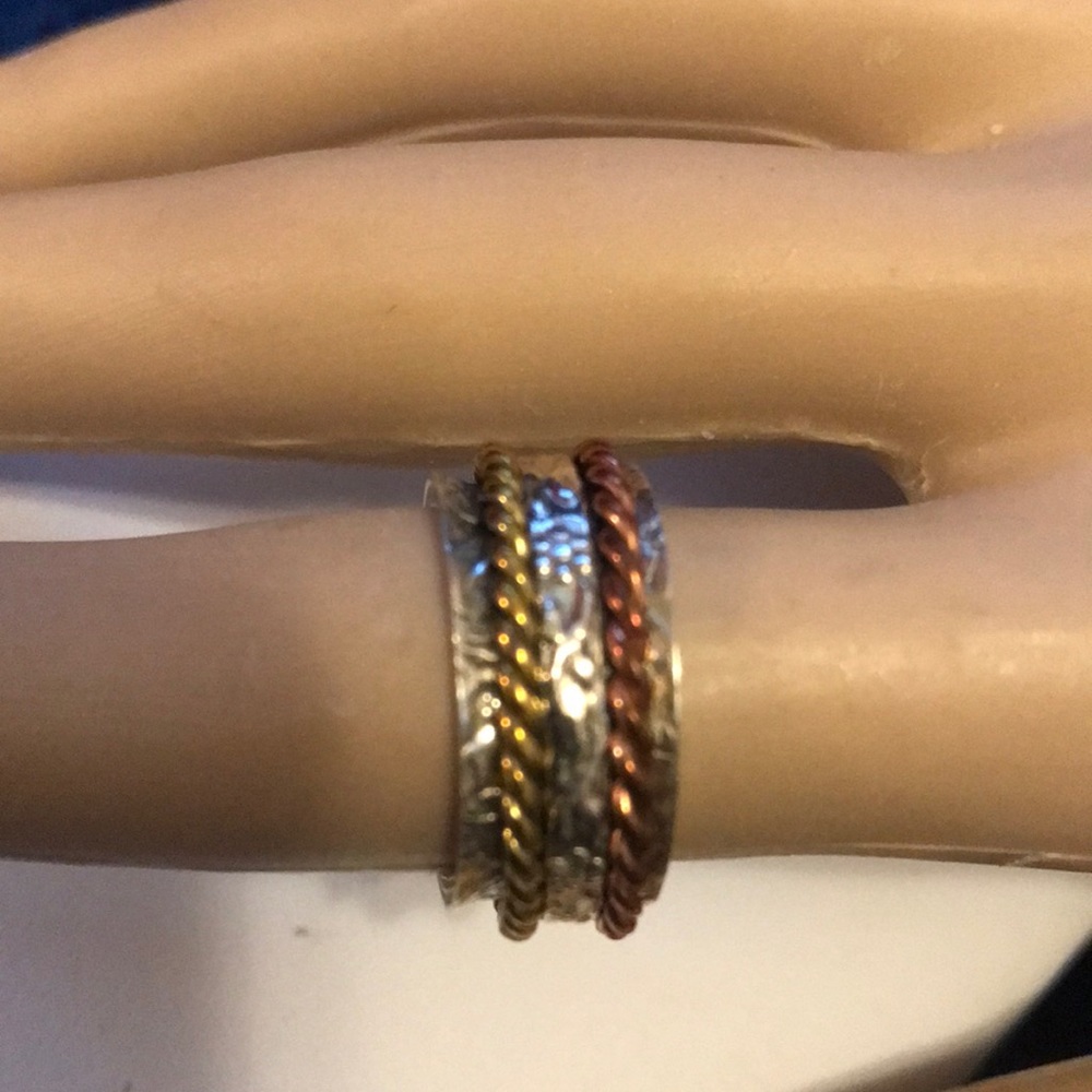 Copper, bronze and sterling spinner ring.